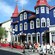 A quaint neighborhood featuring a charming Victorian style sidewalk cafe